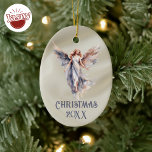 Satin Christmas Angel Ceramic Ornament<br><div class="desc">Embrace the festive spirit of Christmas with our beautiful collection of keepsake personalized satin Christmas angels. Each ornament boasts a unique watercolor angel design, adding a touch of elegance to your holiday decorations. Transform your tree into a Christmas angel showcase with these exquisite ornaments, each telling its own angelic tale....</div>