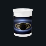Saturn Eclipsed the Sun from Cassini Orbiter   Beverage Pitcher<br><div class="desc">NASA's Cassini spacecraft hid behind Saturn, capturing a dramatic scene: the gas giant's majestic form, seven of its moons, and even a tiny, pale dot of Earth in the distance, all illuminated by the sun filtering through the rings. This unique vantage point, shielded from the sun's glare by Saturn itself,...</div>