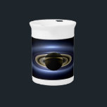 Saturn Eclipsed the Sun from Cassini Orbiter   Beverage Pitcher<br><div class="desc">NASA's Cassini spacecraft hid behind Saturn, capturing a dramatic scene: the gas giant's majestic form, seven of its moons, and even a tiny, pale dot of Earth in the distance, all illuminated by the sun filtering through the rings. This unique vantage point, shielded from the sun's glare by Saturn itself,...</div>