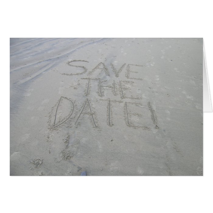 Save the date card, written in the sand