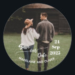 Save the Date Wedding Photo Modern Classic Round Sticker<br><div class="desc">Modern text over your personal photo announcing your wedding date.
Easily change the names for your own custom  wedding design.
From Chessie's Fine Designs.</div>