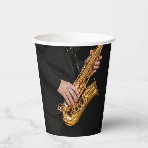 Saxophone Player hands Saxophonist playing jazz   Paper Cups