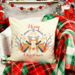 Scandinavian Deer Nordic Merry Christmas Design Throw Pillow<br><div class="desc">Embrace the holiday spirit with this design featuring two Scandinavian-style deer in brown with blue scarves on a cream background. Nordic-inspired elements like pinecones, snowflakes, red berries, and evergreen branches in blue, red, and gold create a festive folklore look. The phrase "Merry Christmas" in red script adds a warm touch,...</div>