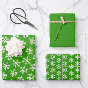 Scandinavian White Snowflake Pattern on Green Wrapping Paper Sheets