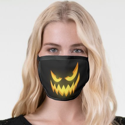 Scary Glowing Face of Laughing Halloween Pumpkin