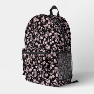 Scatterings of pink and white pearls on black velv printed backpack