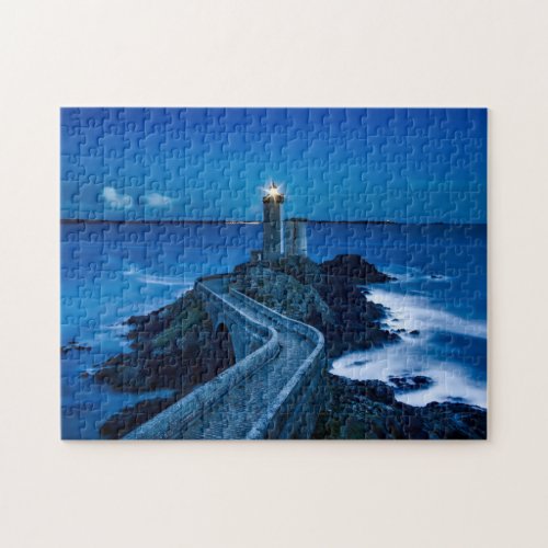 Scenic Lighthouse Shining Bright Over Blue Water  Jigsaw Puzzle