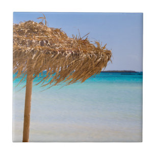 Scenic Tropical Beach with Straw Umbrella Ceramic Tile