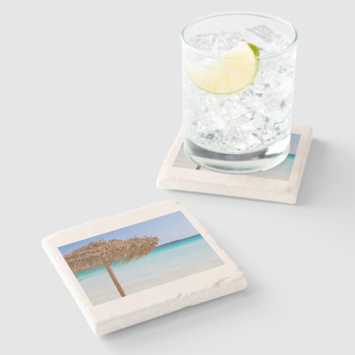 Scenic Tropical Beach with Straw Umbrella Stone Coaster