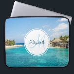 Scenic Tropical Beach with Thatched Huts Monogram Laptop Sleeve<br><div class="desc">A laptop sleeve with a beautiful photo featuring a tropical beach resort. 
Pretty blue water and white sandy beach with thatched huts giving it a tranquil island vibe.
A white circle layered over top with your name and monogram initial inside.</div>