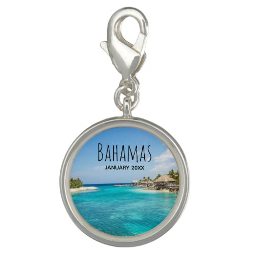 Scenic Tropical Beach with Thatched Huts Photo Charm