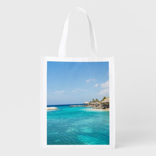 Scenic Tropical Beach with Thatched Huts Photo Grocery Bag