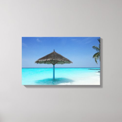 Scenic Tropical Beach with Thatched Umbrella Canvas Print