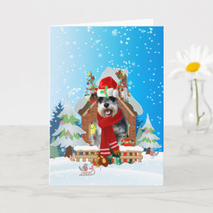 Schnauzer in snow with Christmas gifts Card