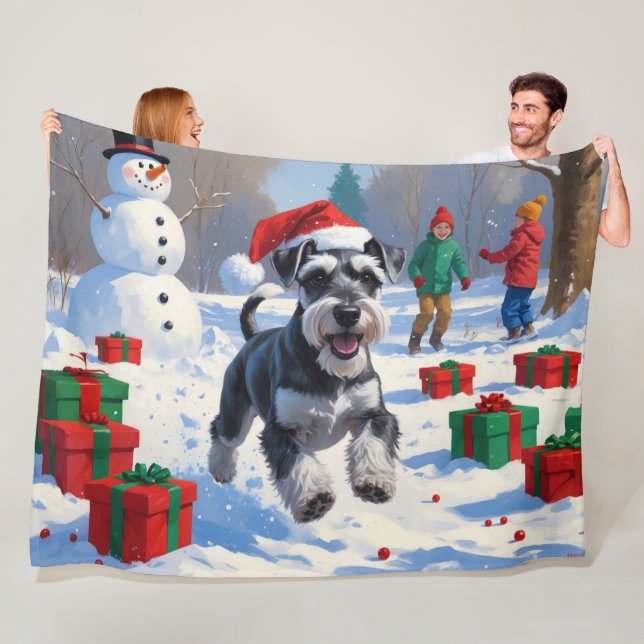 Schnauzer Running in Snow with Christmas Hat Fleece Blanket (In Situ)