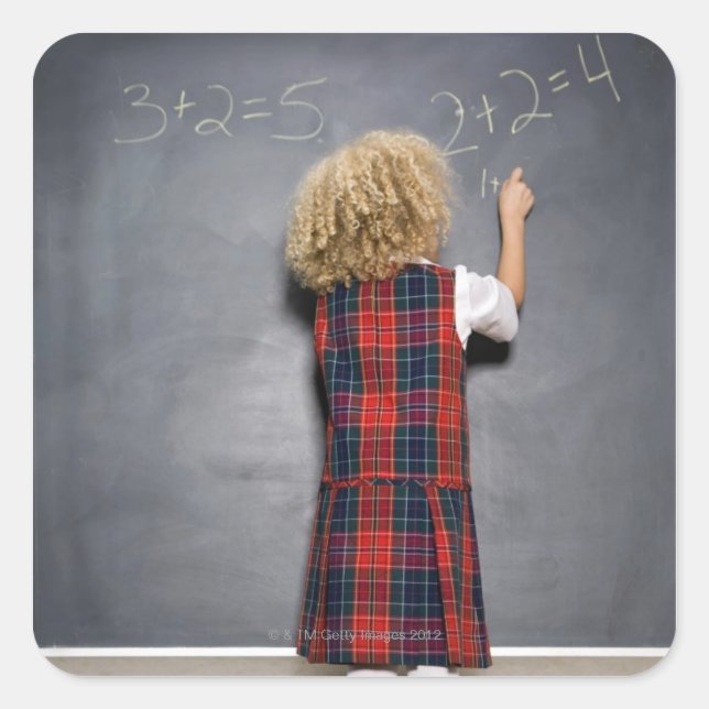 School girl (6-7) writing on blackboard, square sticker (Front)