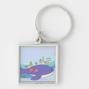 School of fishes swimming in underwater town keychain
