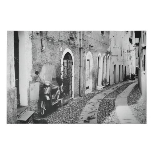 Scooter in a street in Italy in black and white Faux Canvas Print
