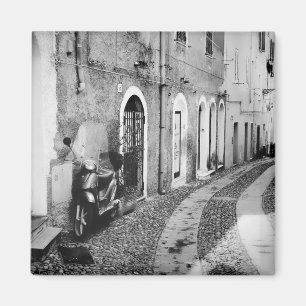 Scooter in a street in Italy in black and white Magnet