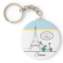 Scooter riding past the Eiffel Tower Paris France Keychain Scooter riding past the Eiffel Tower Paris France Keychain