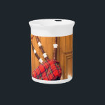 Scotland Bagpipe Tartan Plaid Musical Instrument Drink Pitcher<br><div class="desc">Scotland Bagpipe Tartan Plaid Musical Instrument Celebrate the rich musical heritage of Scotland with the "Scotland Bagpipe Tartan Plaid Musical Instrument." This artwork captures the beauty and tradition of the bagpipe, a beloved symbol of Scottish culture making it a perfect piece for any enthusiast.. Description: The image features a photograph...</div>