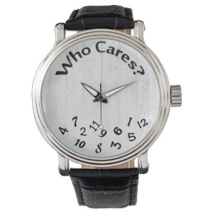 scrambled numbers on whitewashed wood watch