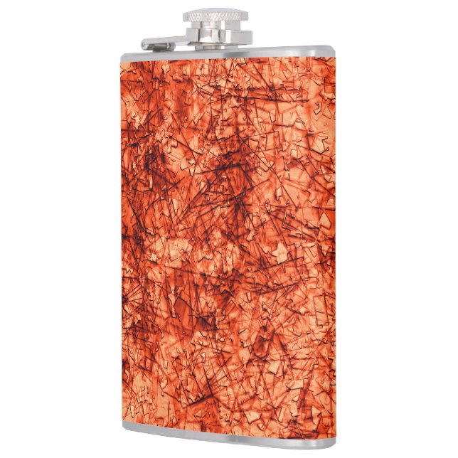 Scratches on a lightly spotted coral background flask (Left)