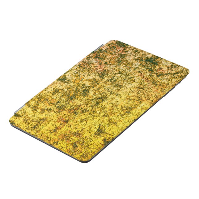 Scratches on a lightly spotted ocher yellow iPad mini cover (Side)