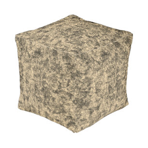Scratches on scratches on a lightly spotted khaki pouf