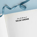 Script and Serif Varsity Style From The Library Of Self-inking Stamp<br><div class="desc">Script and Serif Varsity Style Self Inking Rubber Stamp with stripes that is easy to personalize. Great stamp for your books. Personalize it by replacing the placeholder text. For more options such as to change the font, it's size or spacing between letters click the "Customize it" button. *Please note that...</div>