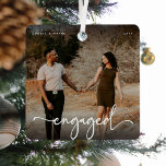 Script Engaged Photo Keepsake Gift Metal Ornament<br><div class="desc">Design is composed of fun and elegant typography with script and sans font. Simply customize name/s,  year and upload a favorite photograph of the loved up couple!</div>