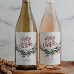 Script Merry Christmas Greenery Holiday Party Wine Label<br><div class="desc">A festive,  red,  green and white merry christmas wine label featuring bold script and watercolor greenery with leaves and berries. Makes a great gift or christmas holiday party favor.</div>