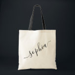 Script Name Personalized Modern Simple Tote Bag<br><div class="desc">Chic personalized labeled reusable canvas tote bag with custom name text for bridesmaid gifts, bachelorette parties, birthday favors, and girls trip keepsakes, and graduation gift for cute college and dorm room storage. Perfect for sports and hobby gear storage and transport. Colors and fonts are editable, just click “customize further” to...</div>