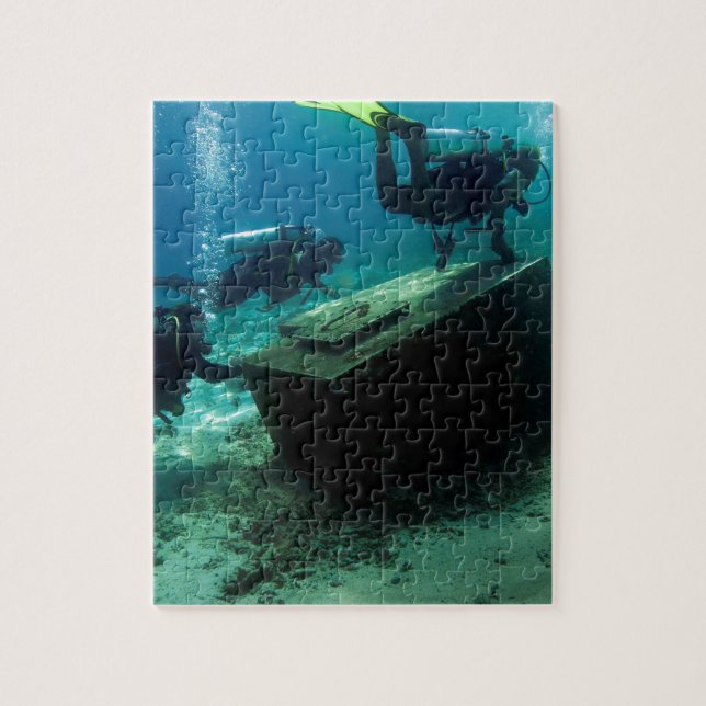 Scuba divers underwater with treasure chest jigsaw puzzle (Vertical)