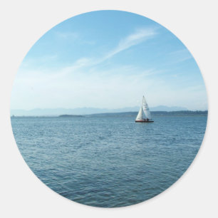 sea and sail boat under blue sky classic round sticker