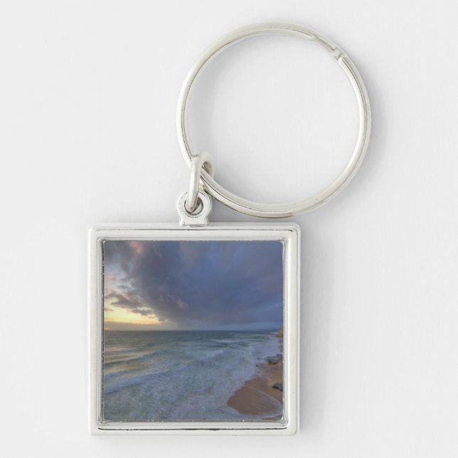 Sea cliffs catch days last light at Pomponi Keychain (Front)