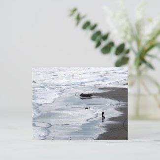 Sea coming to shore at dusk postcard
