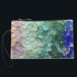 Sea Glass Wristlet<br><div class="desc">Carry a sea glass collection everywhere you go! This little clutch features of rainbow of sea glass collected on the shores of Puerto Rico.</div>