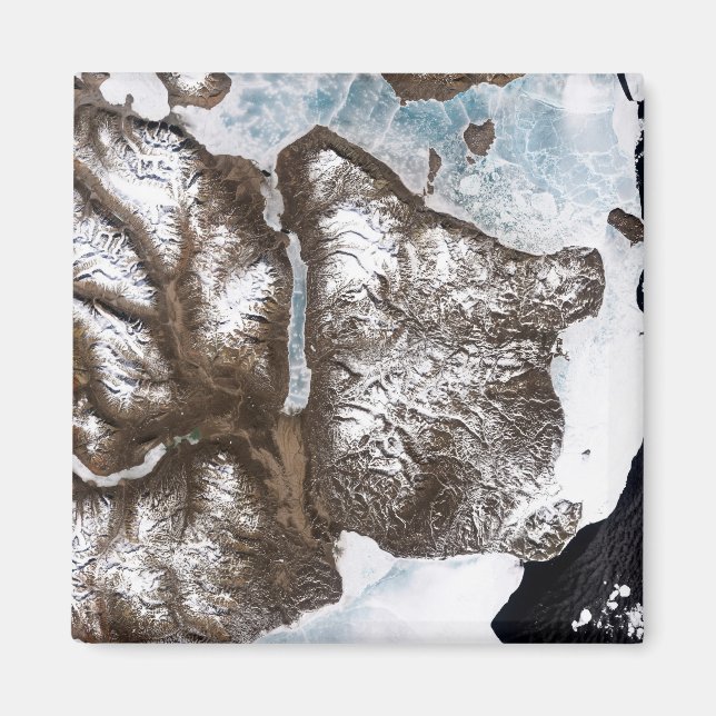 Sea ice lines the shoreline in eastern Greenlan Magnet (Front)