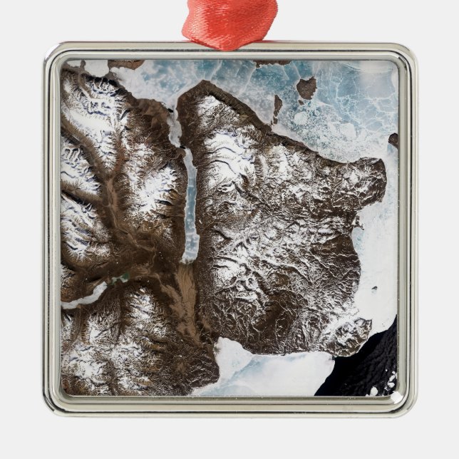 Sea ice lines the shoreline in eastern Greenlan Metal Ornament (Front)