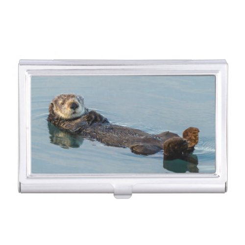 Sea otter floating on back in ocean business card holder