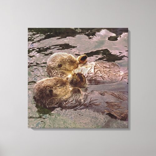 Sea Otters Holding Hands Canvas Print