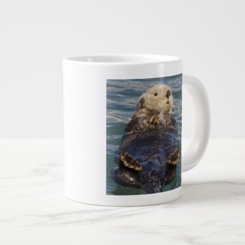 Sea otters play on icebergs at Surprise Inlet Giant Coffee Mug