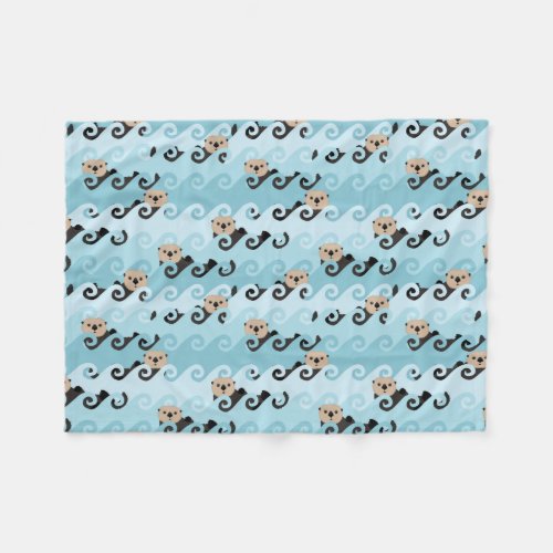 Sea Otters Riding the Waves Fleece Blanket