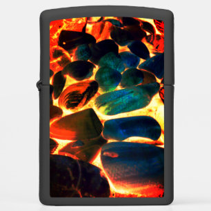 Sea oyster shell on red-hot volcanic lava or ember zippo lighter