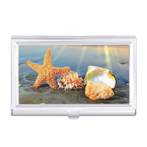 Sea shells and starfish on beach business card case