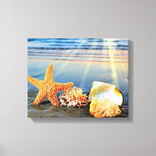 Sea shells and starfish on beach canvas print