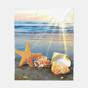 Sea shells and starfish on beach fleece blanket