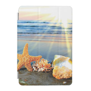 Sea shells and starfish on beach iPad mini cover