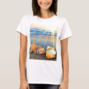 Sea shells and starfish on beach T-Shirt